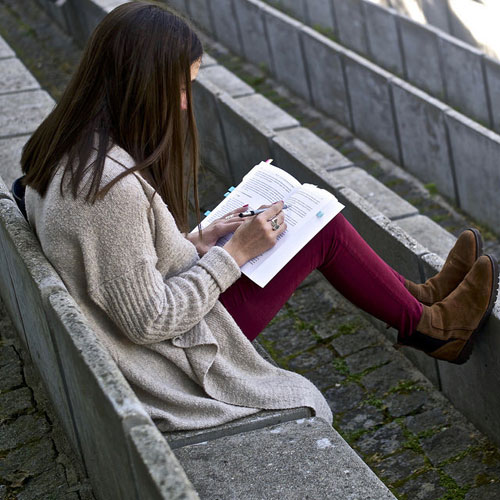 girl studying at park