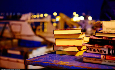 purple book stacks at night