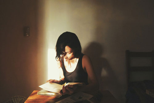 reading by window light