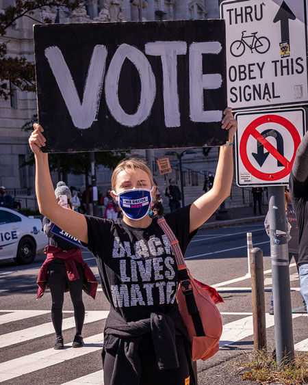 Vote sign by Black Lives Matter protester